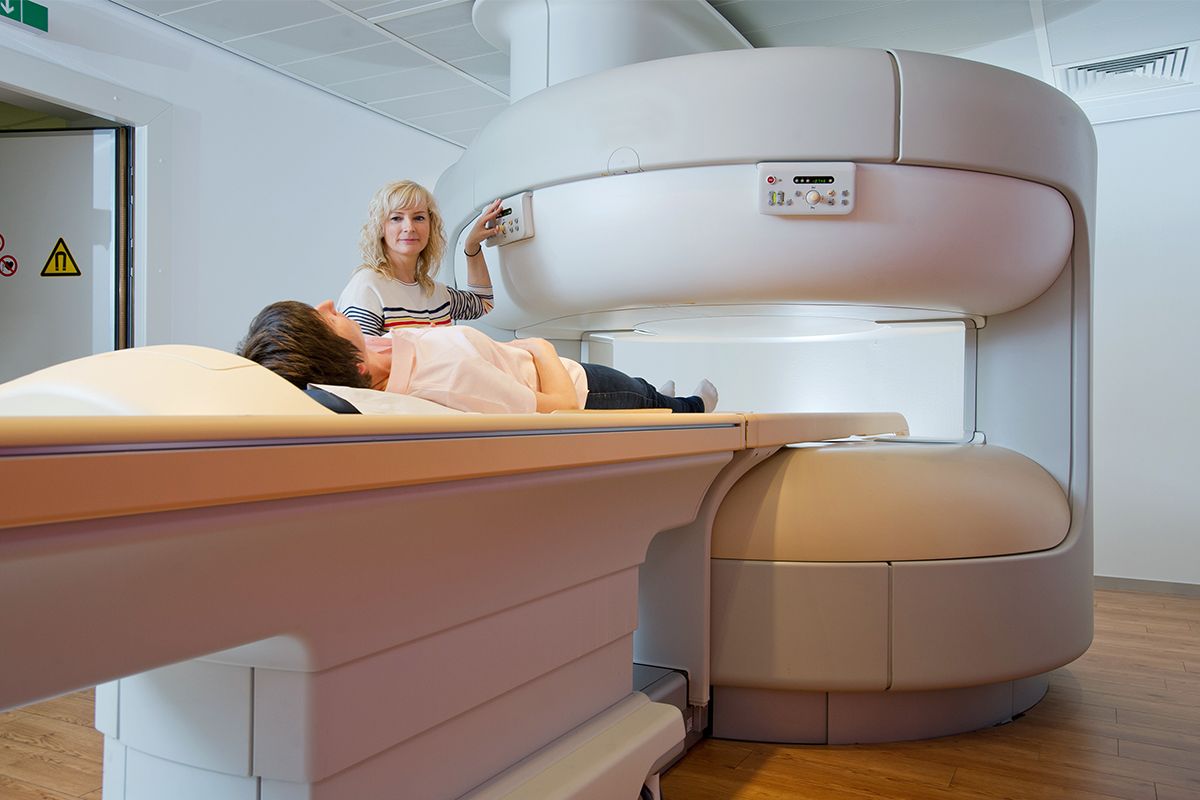 A patient getting an Open MRI.