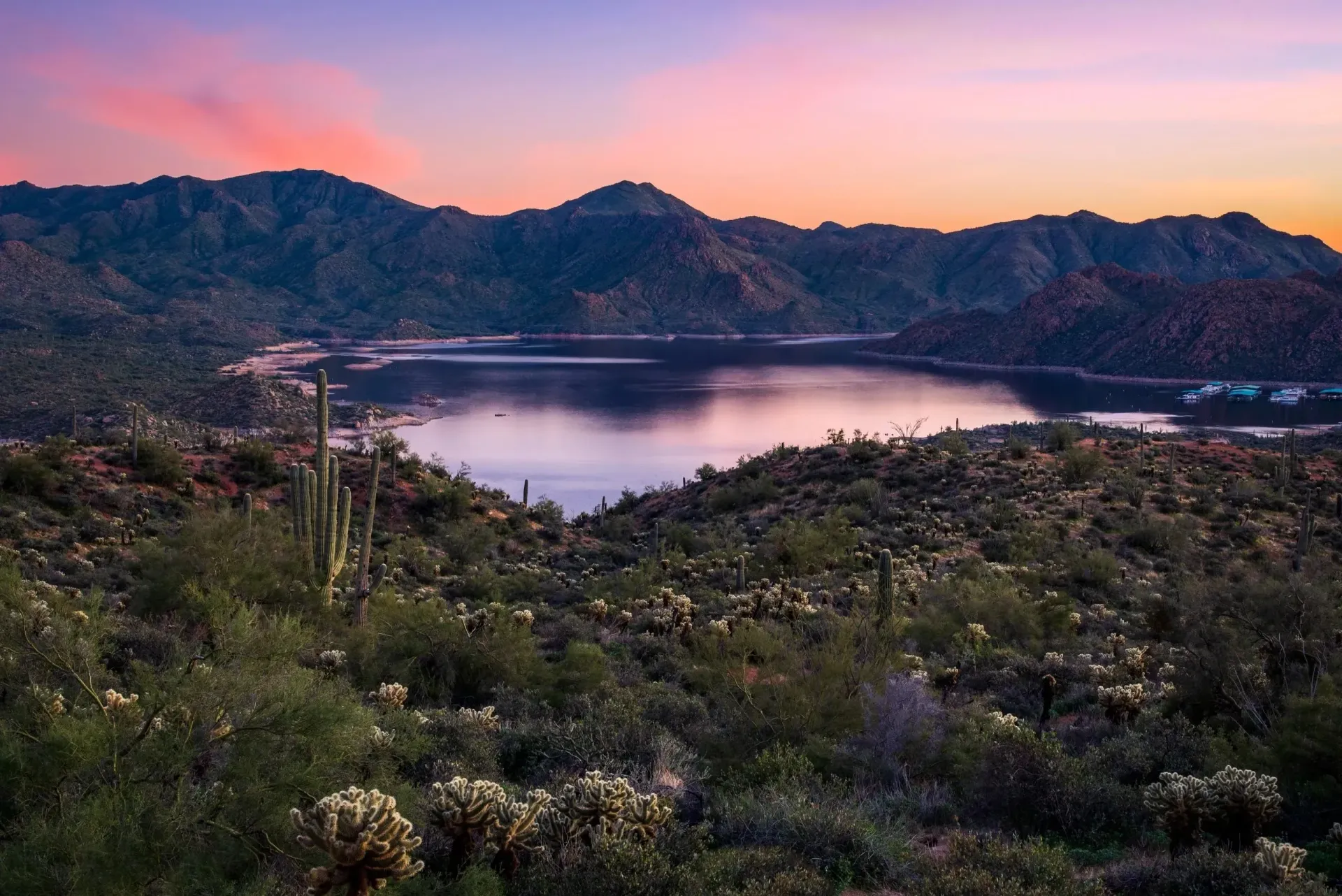 Beautiful scenic photo from Bartlett Lake from middle of the lake on a beach looking a sunset over the mountains