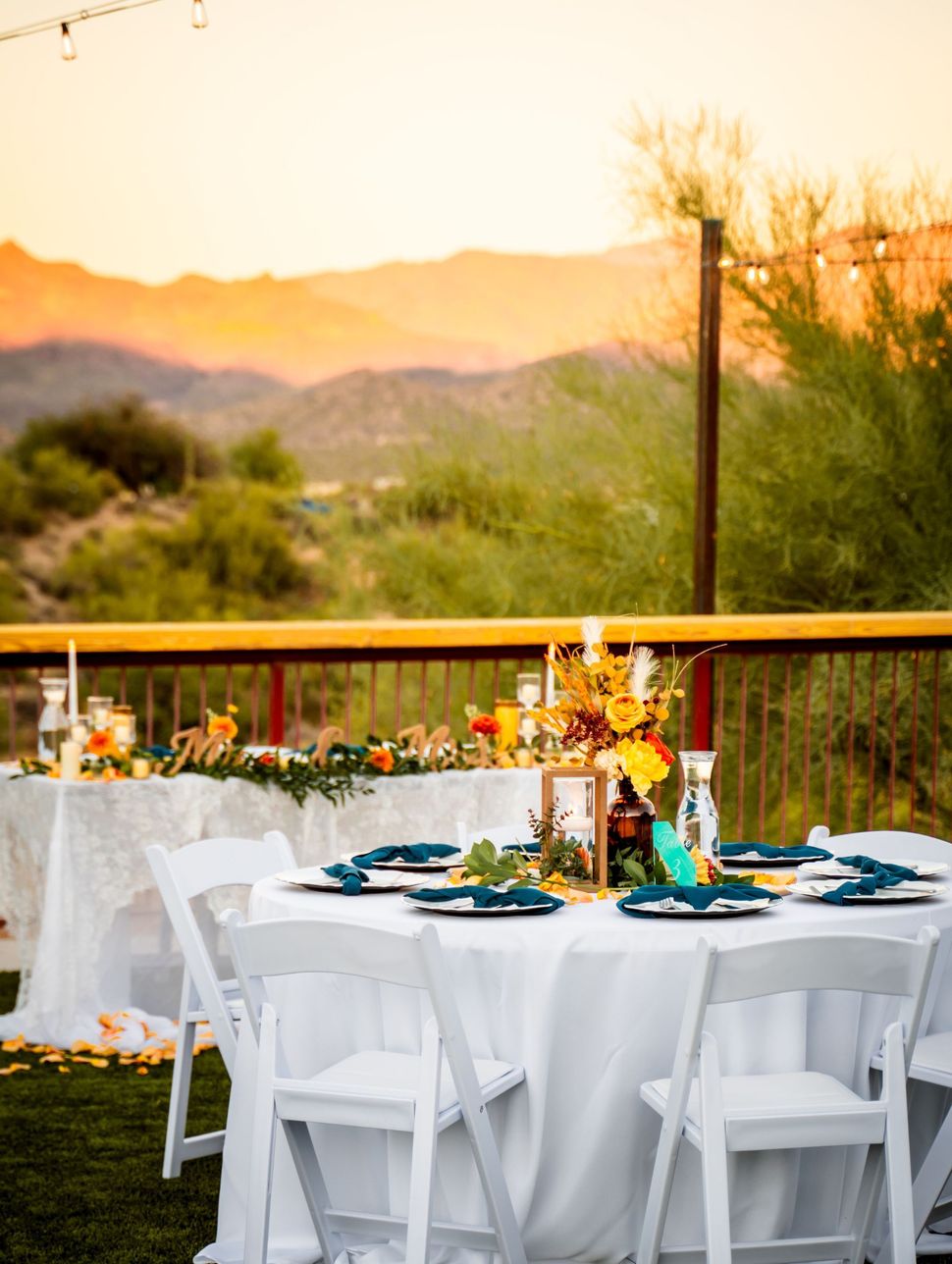 Bride and groom table at sunset right before wedding dinner at Venue at the Cove