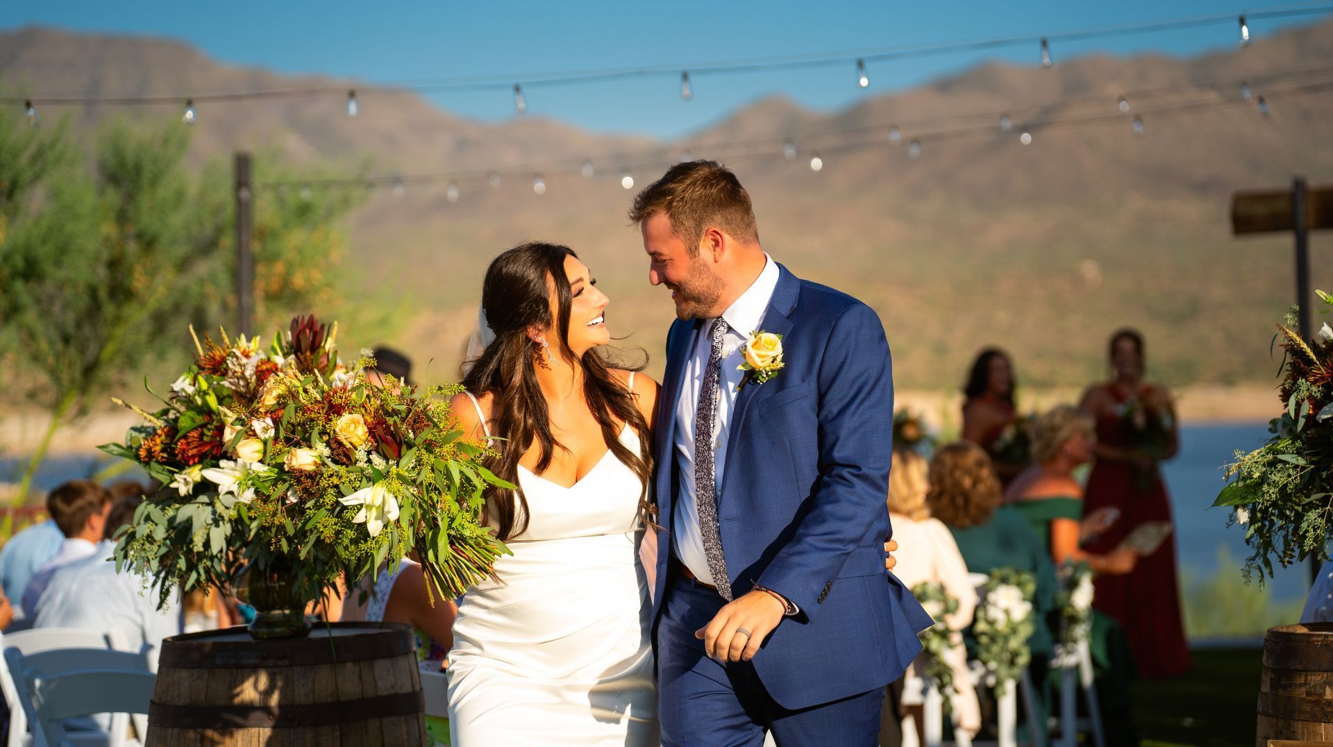 Bride and groom walking down isle after their dream wedding ceremony at Venue at the Cove