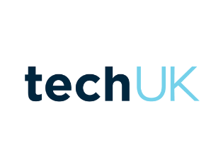 the logo for techuk is blue and black on a white background .
