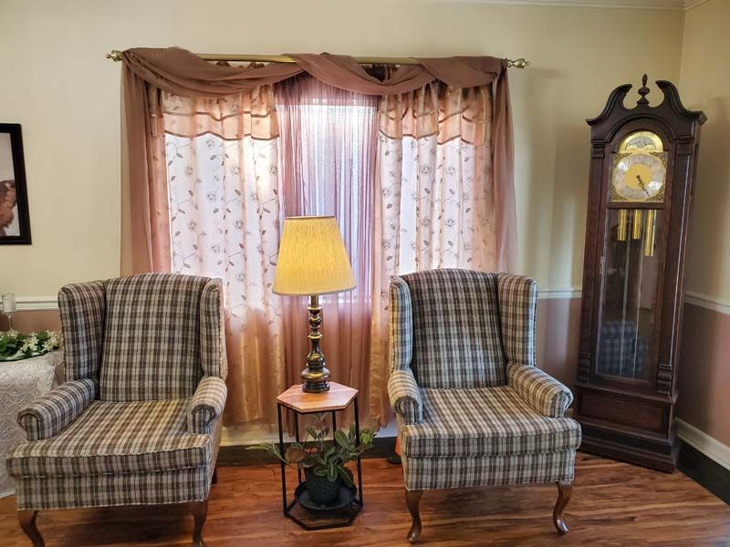 Two chairs and lamp at at Douglass & Dunaway Mortuary in Hawthorne, CA