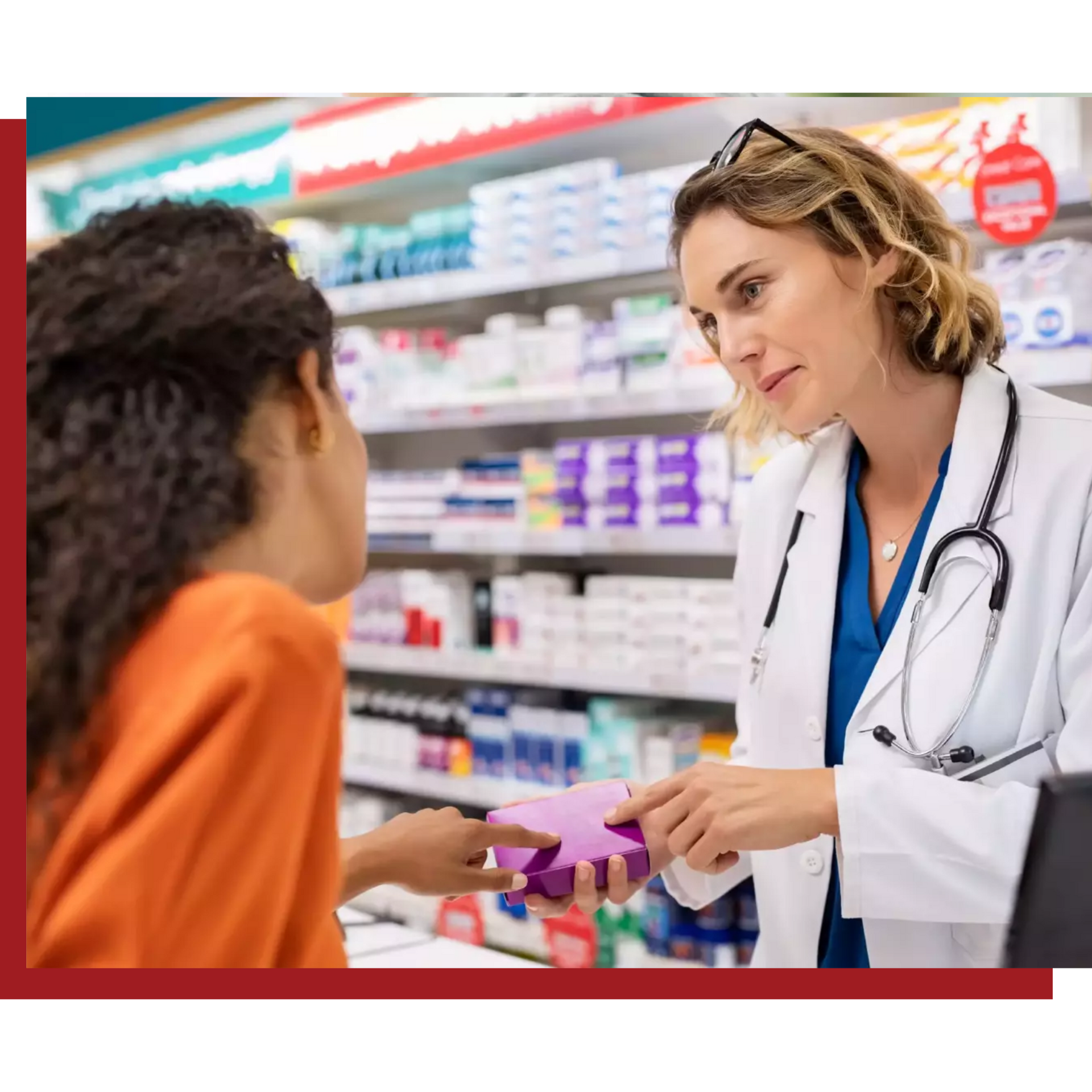 A female pharmacist is talking to a woman in a pharmacy.