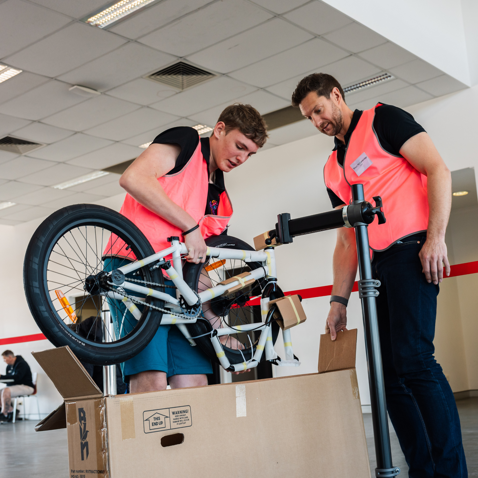 Shaun McCambridge fixing a bike 