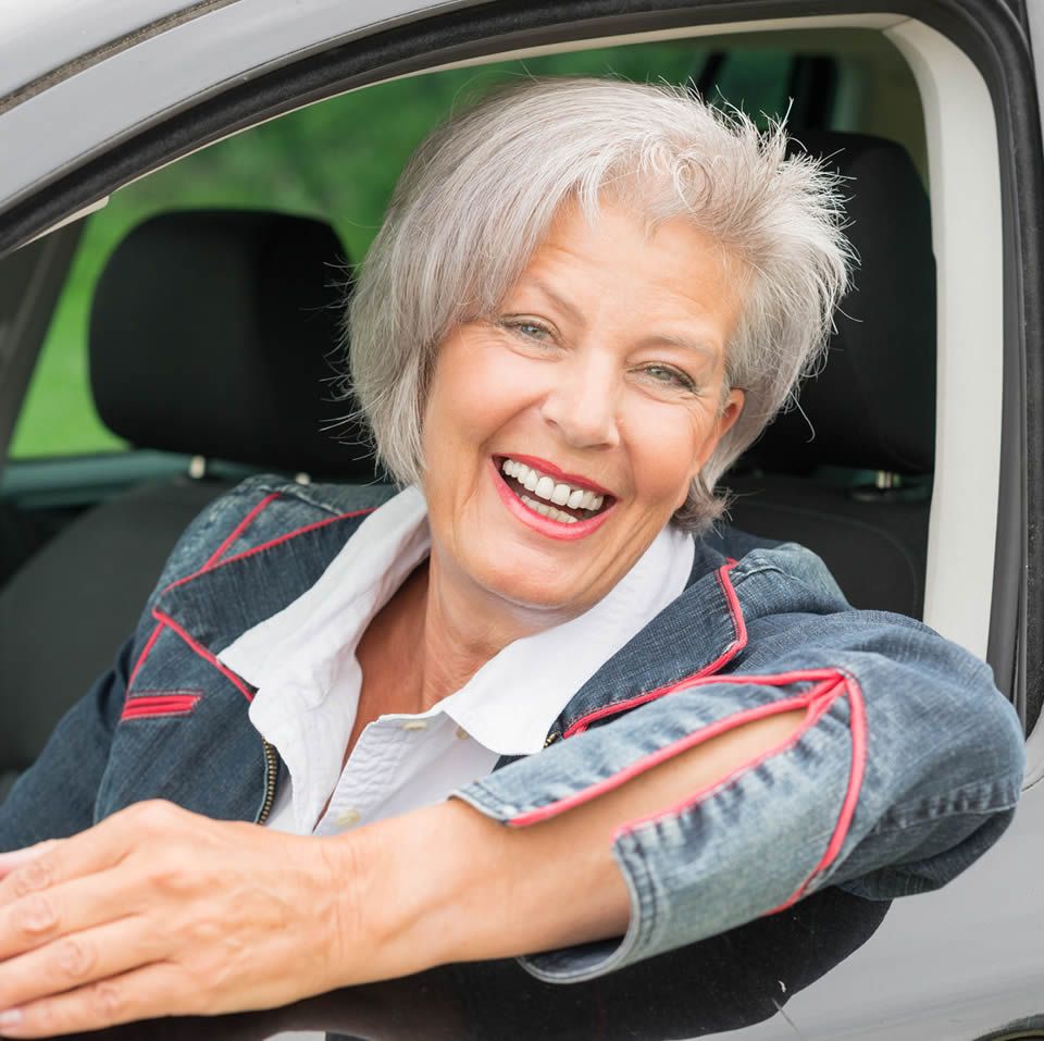 Senior Woman On Her Driving Car — Greenville, SC — Drive Alert Training Academy, LLC