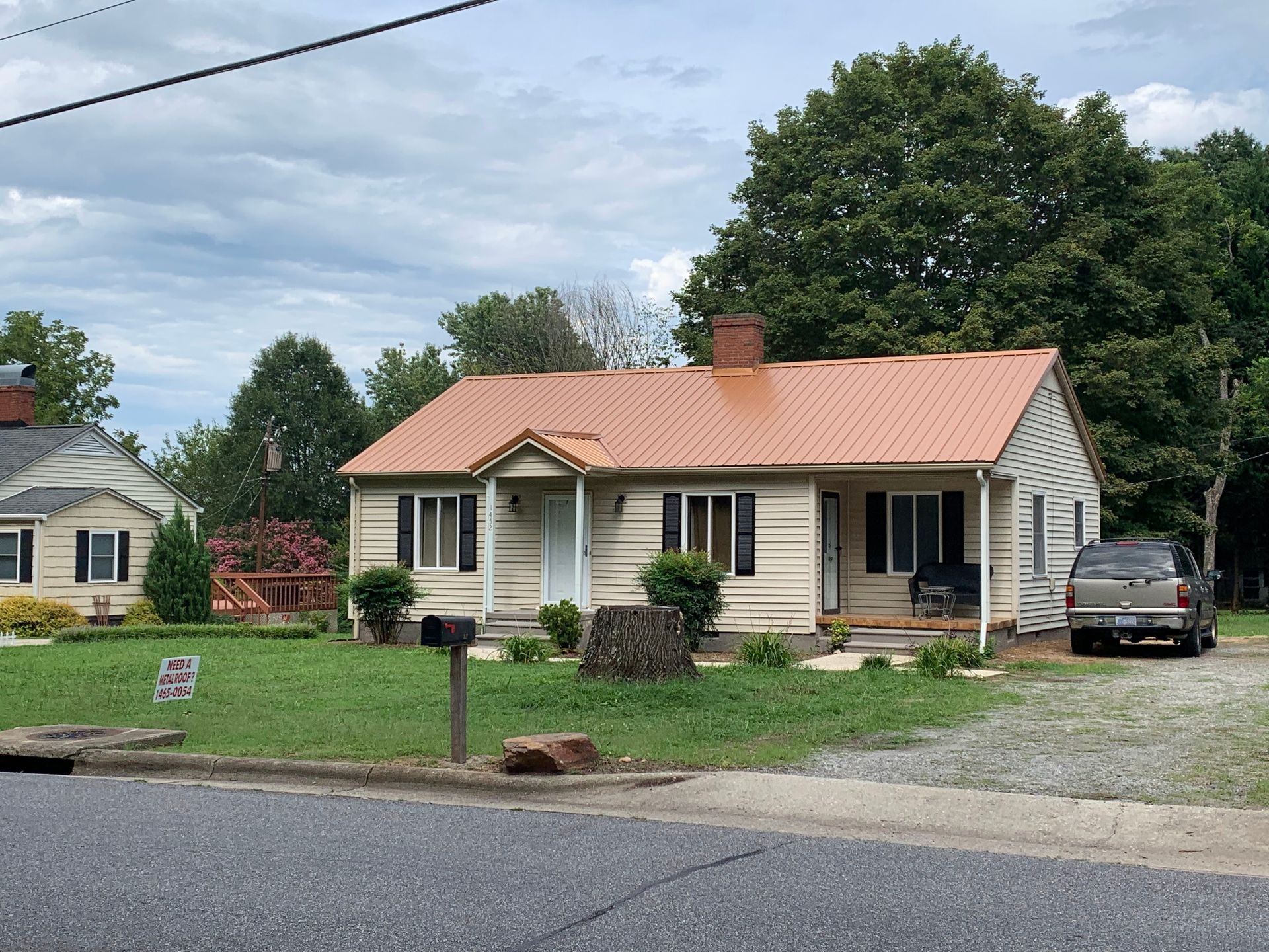 Beige House With Car Beside — Newton, NC — Piedmont Metal Roofing LLC
