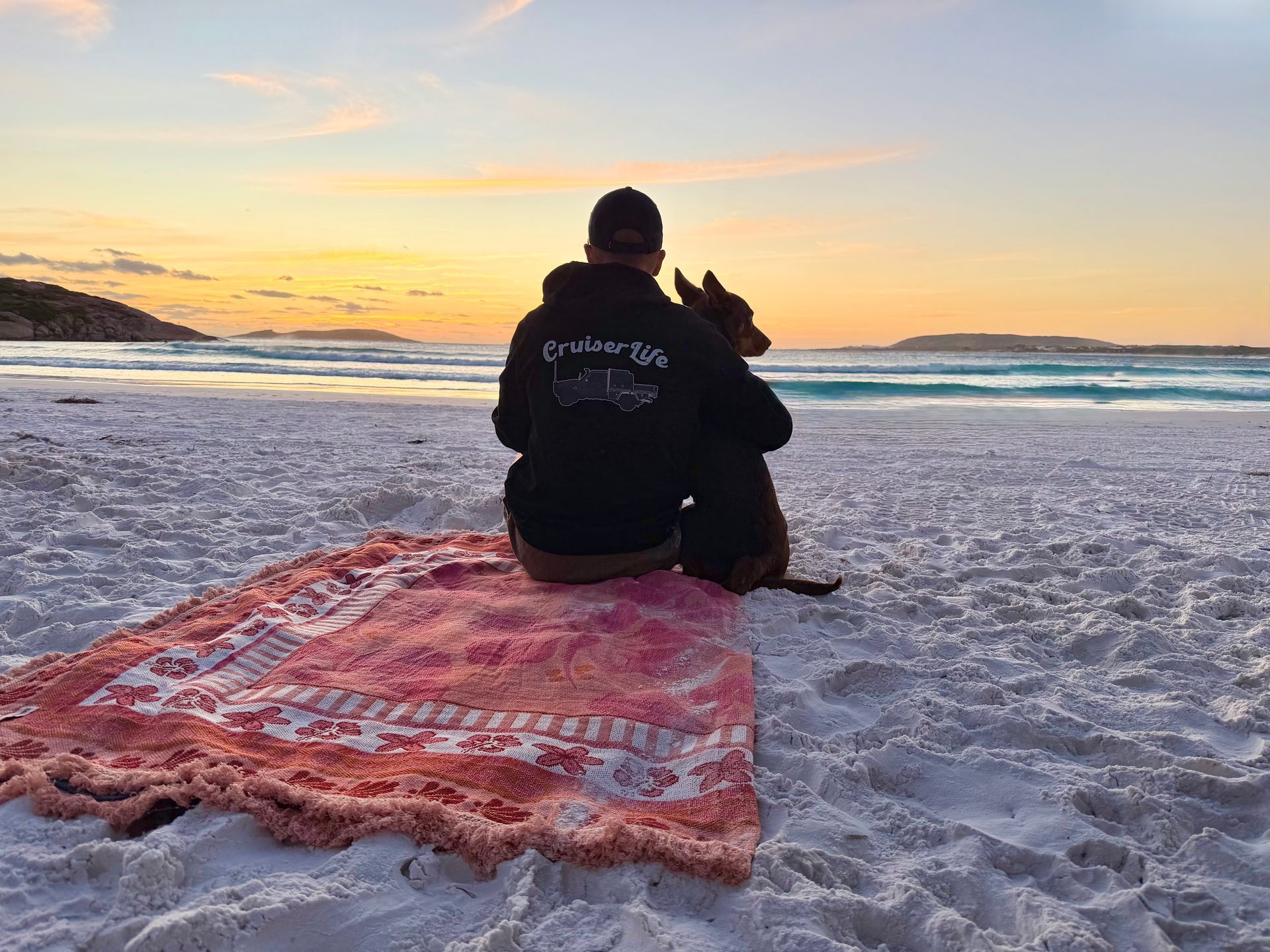 4WD touring lifestyle camping on a beach at sunset