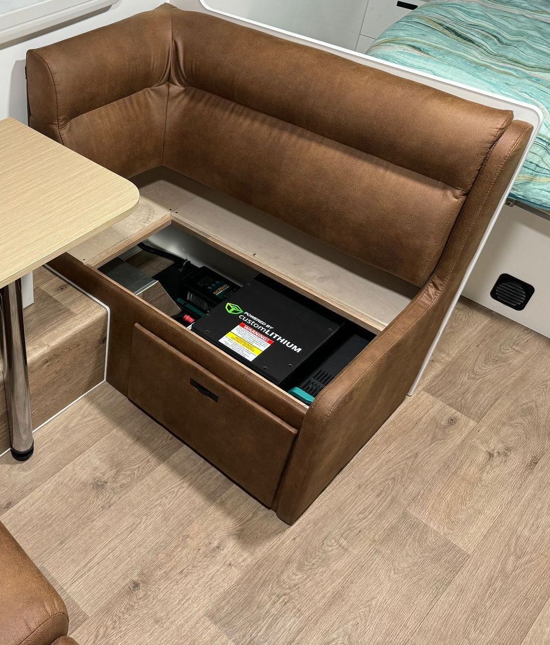 Caravan with an off-grid power system installed with lithium battery, inverter and charging system