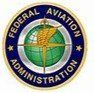 A logo for the federal aviation administration with a globe in the center.