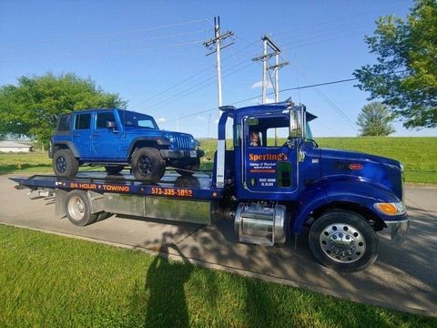 Towing Truck with Workers — Cape Girardeau, MO — Sperling's Garage and Wrecker Service