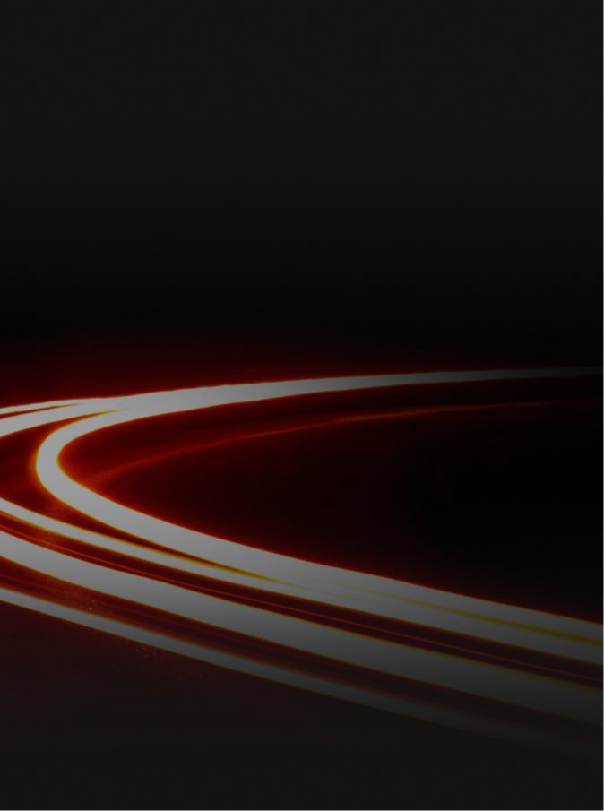 Curved light trails on a black background, with a red glow near the curve. | ECP Auto Service