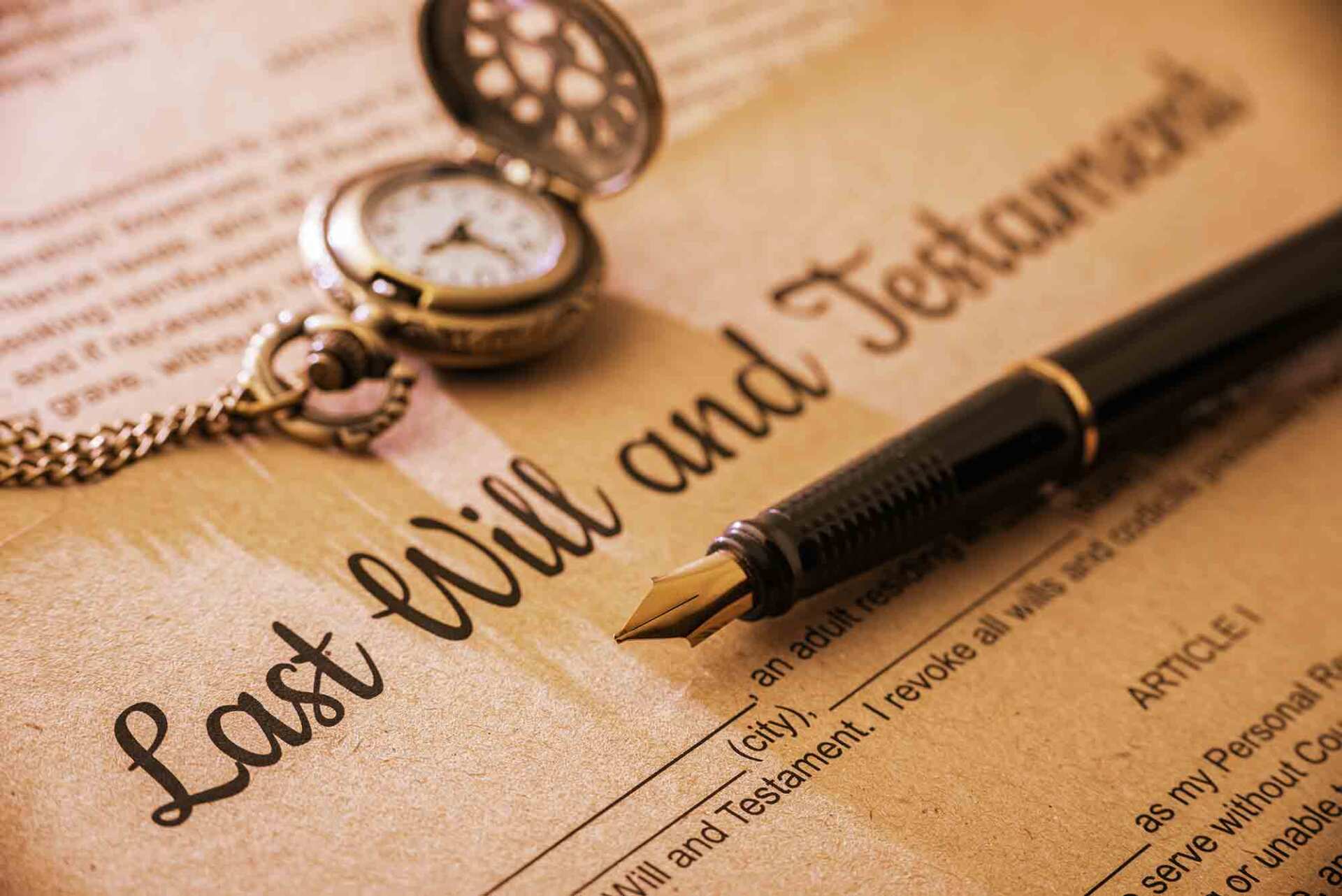 Fountain pen, a pocket watch on a last will and testament. A form is printed on a mulberry pape