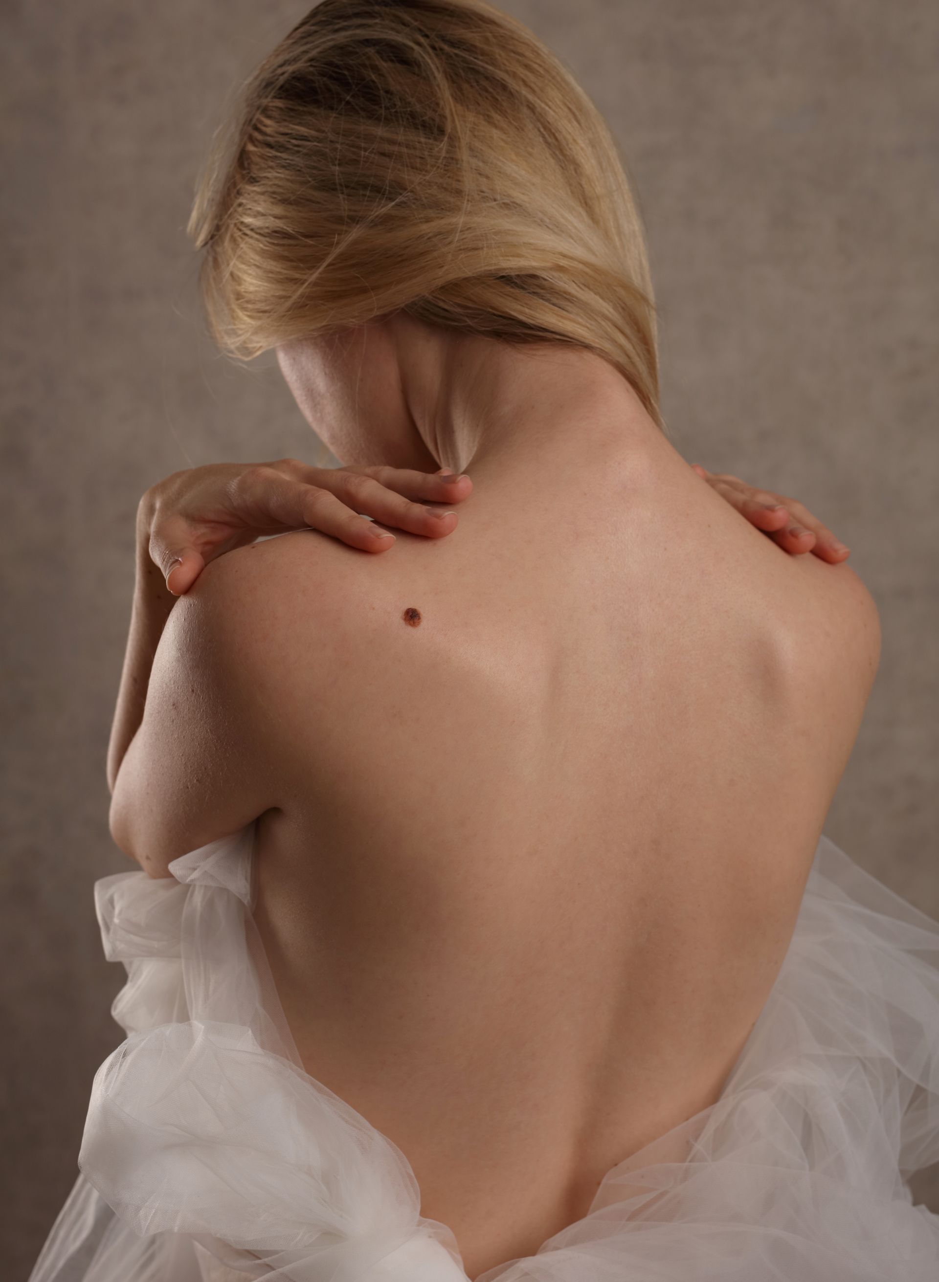 A close up of a woman 's back