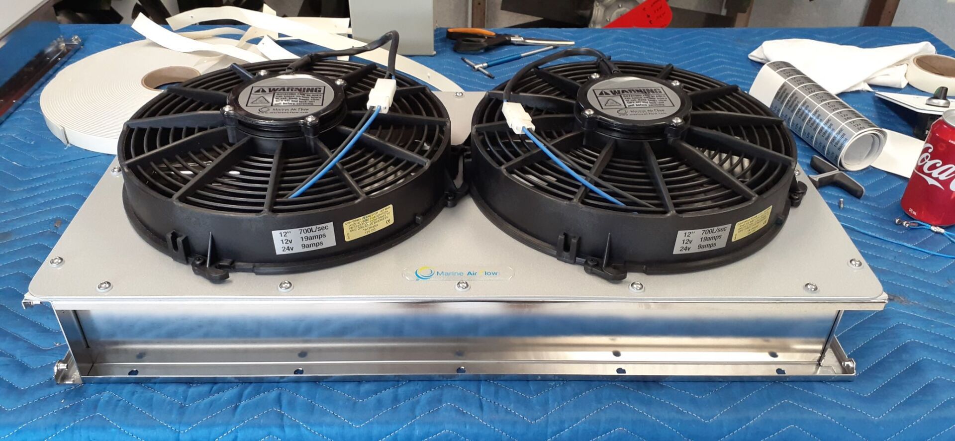 Fans mounted on the grille ready for export