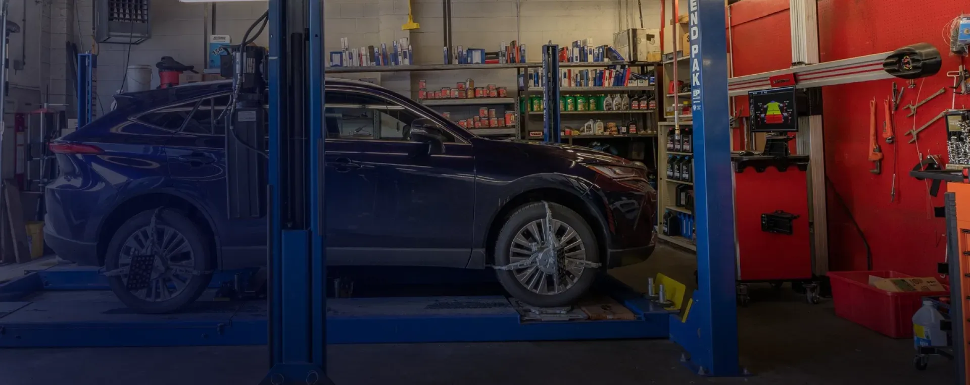 Vehicle inside our garage, keeping your family safely on the road in Seattle, WA | Masters Auto & Tire