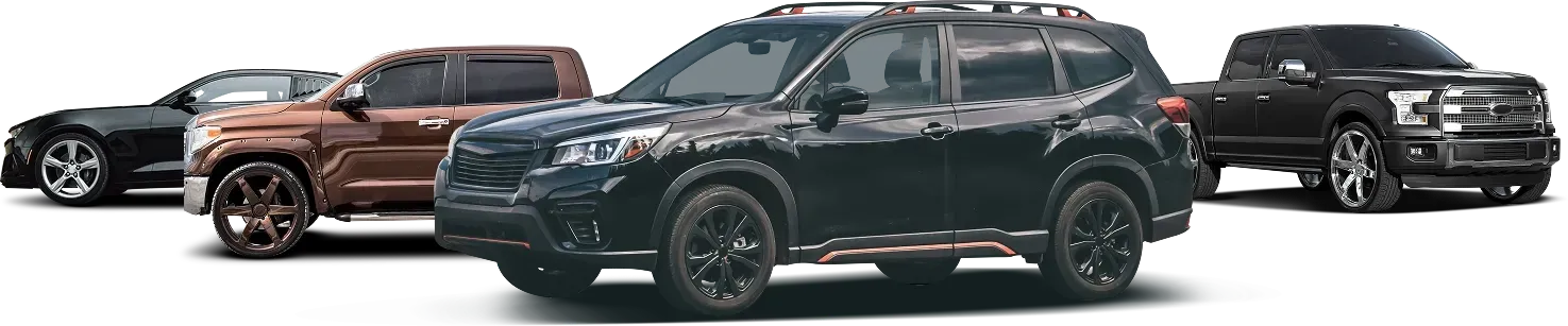 Four vehicles parked outside | Masters Auto & Tire