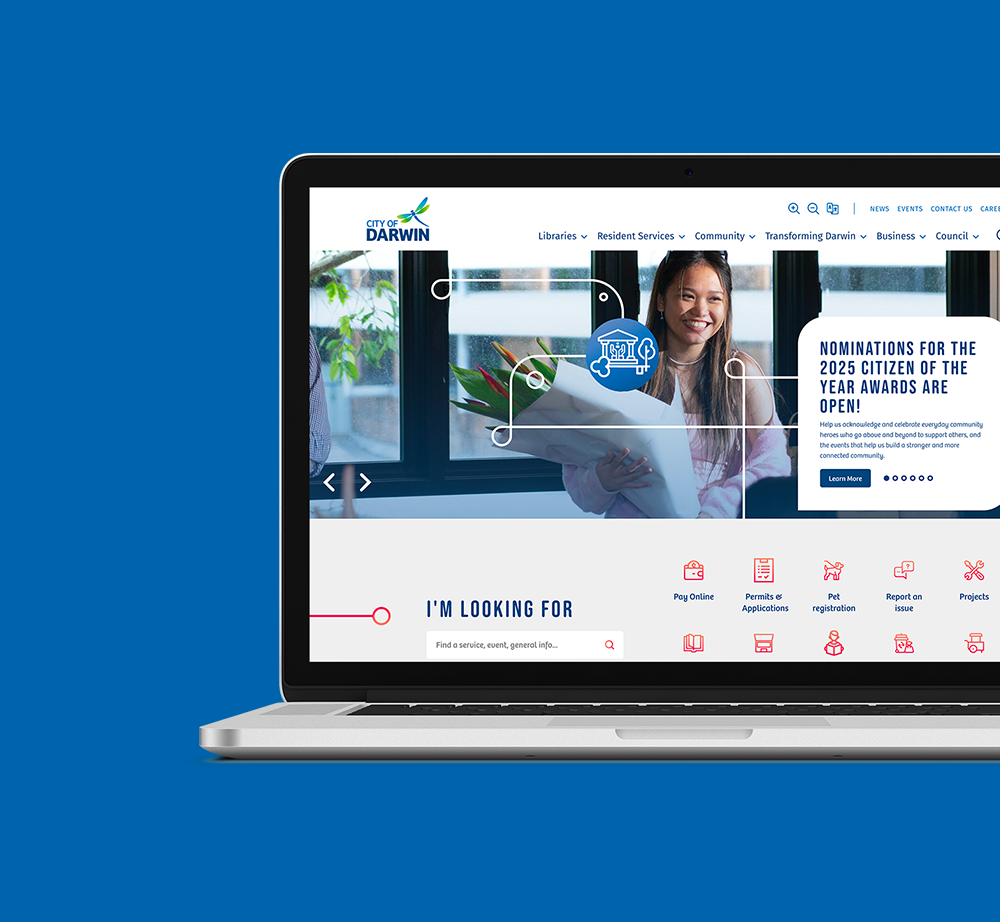 A laptop computer with a woman holding a newspaper on the screen.