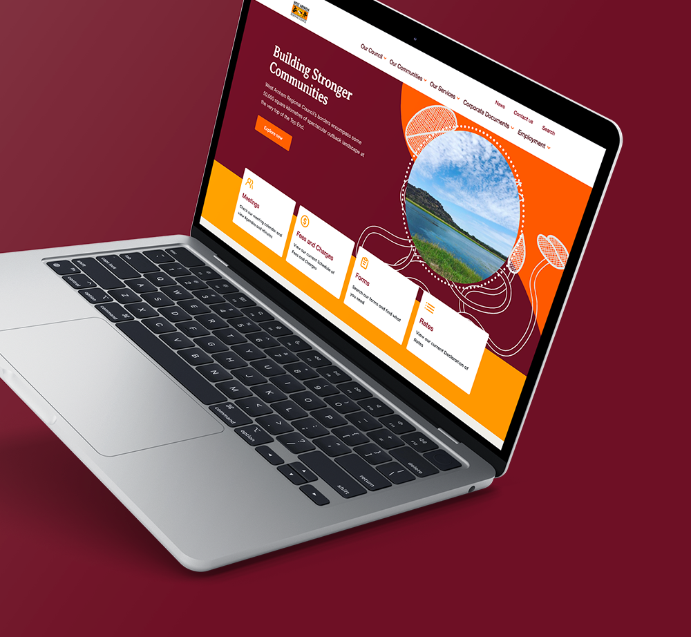 A laptop computer is open to a website for the automobile association of the northern territory.