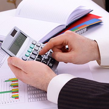 Professional chartered accountant doing the calculation 