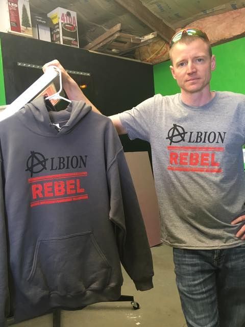 Man Holding a Hoodie — Gladbrook, IA — Kustom Kreations