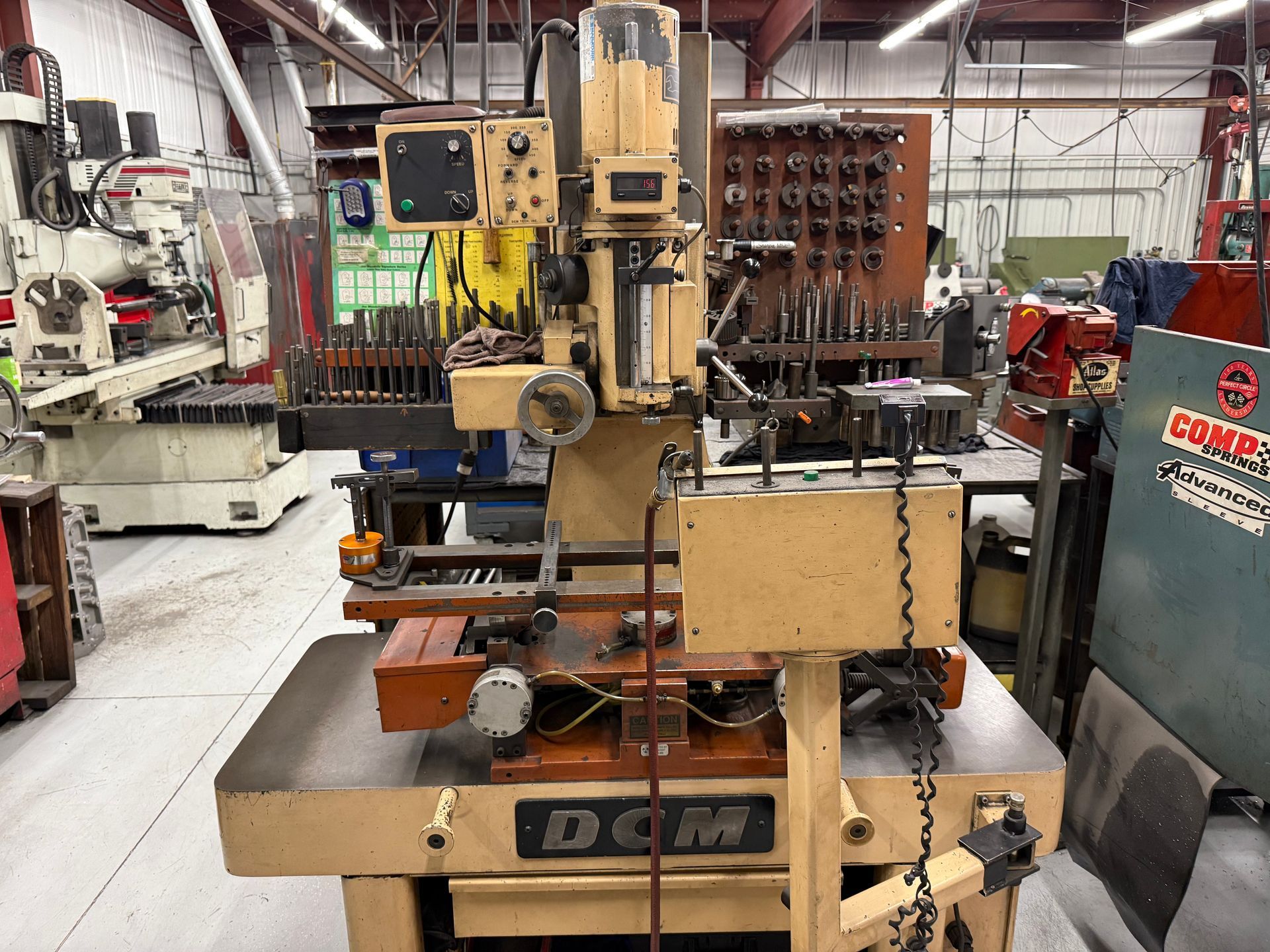 A machine that has the word dcm on it