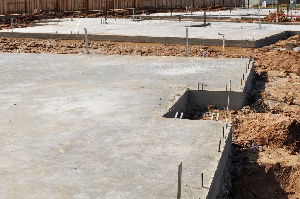 A Concrete Foundation Is Being Built On A Construction Site — Tuncote Concrete Constructions in Raymond Terrace, NSW