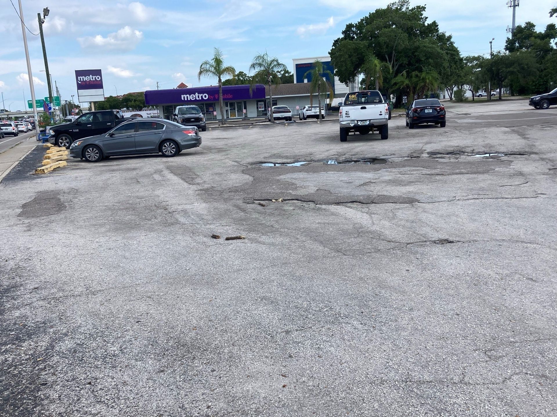 A lot of cars are parked in a parking lot