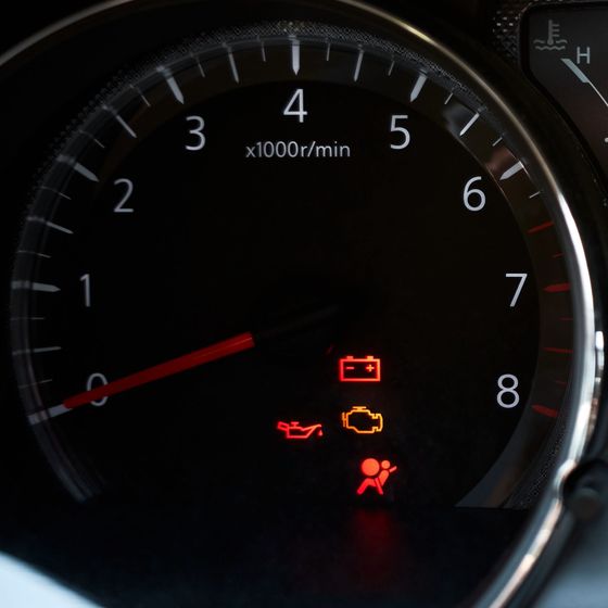 Check engine light is illuminated in a car.