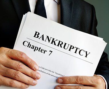 Bankruptcy Services — Lawyer Holding Bankruptcy Paper in Orlando, FL