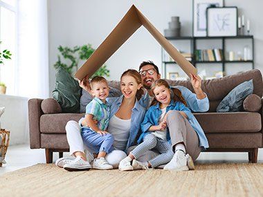 Family Law — Happy Family Holding Cardboard in Orlando, FL