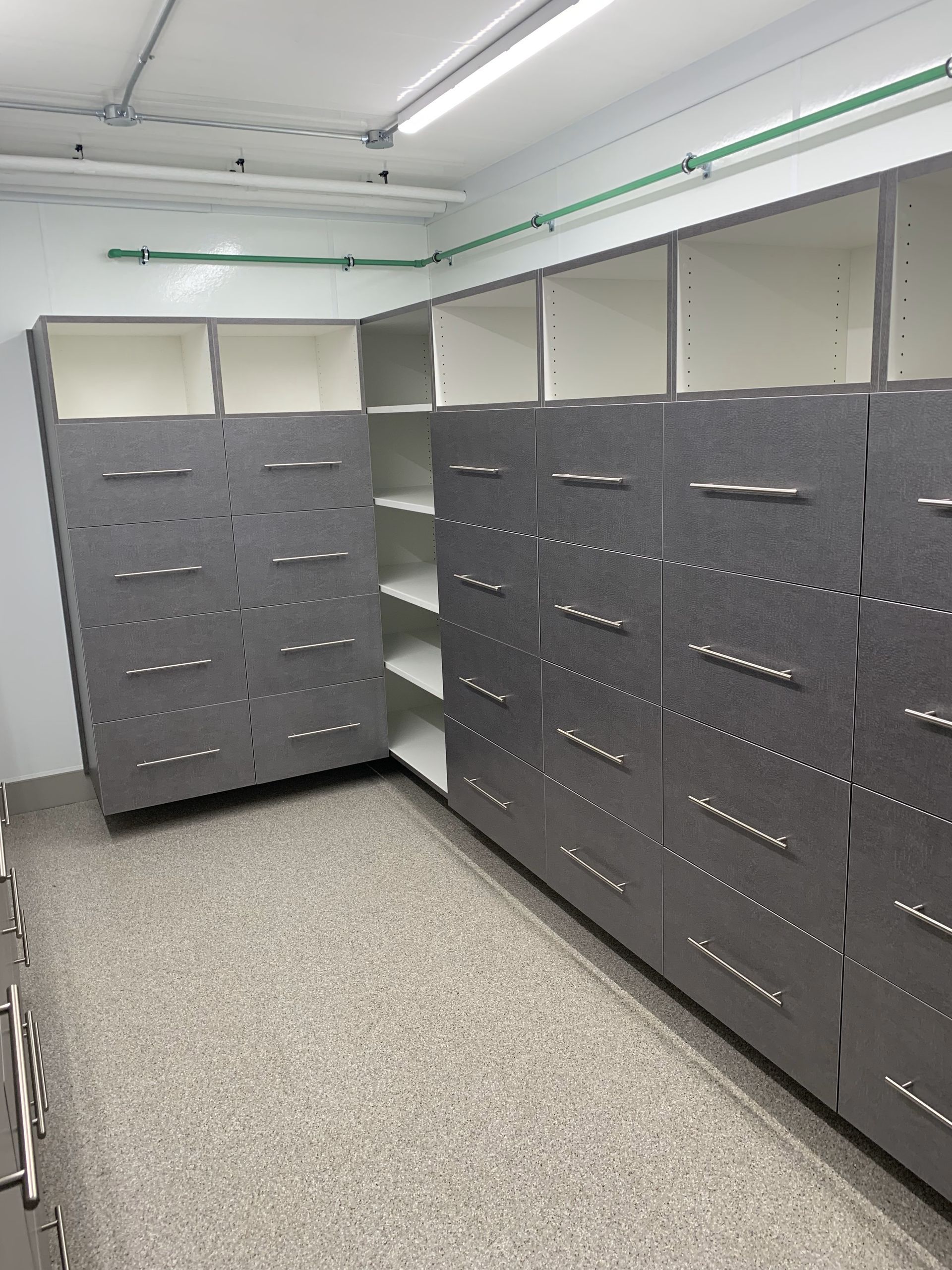 A room filled with lots of shelves and drawers.