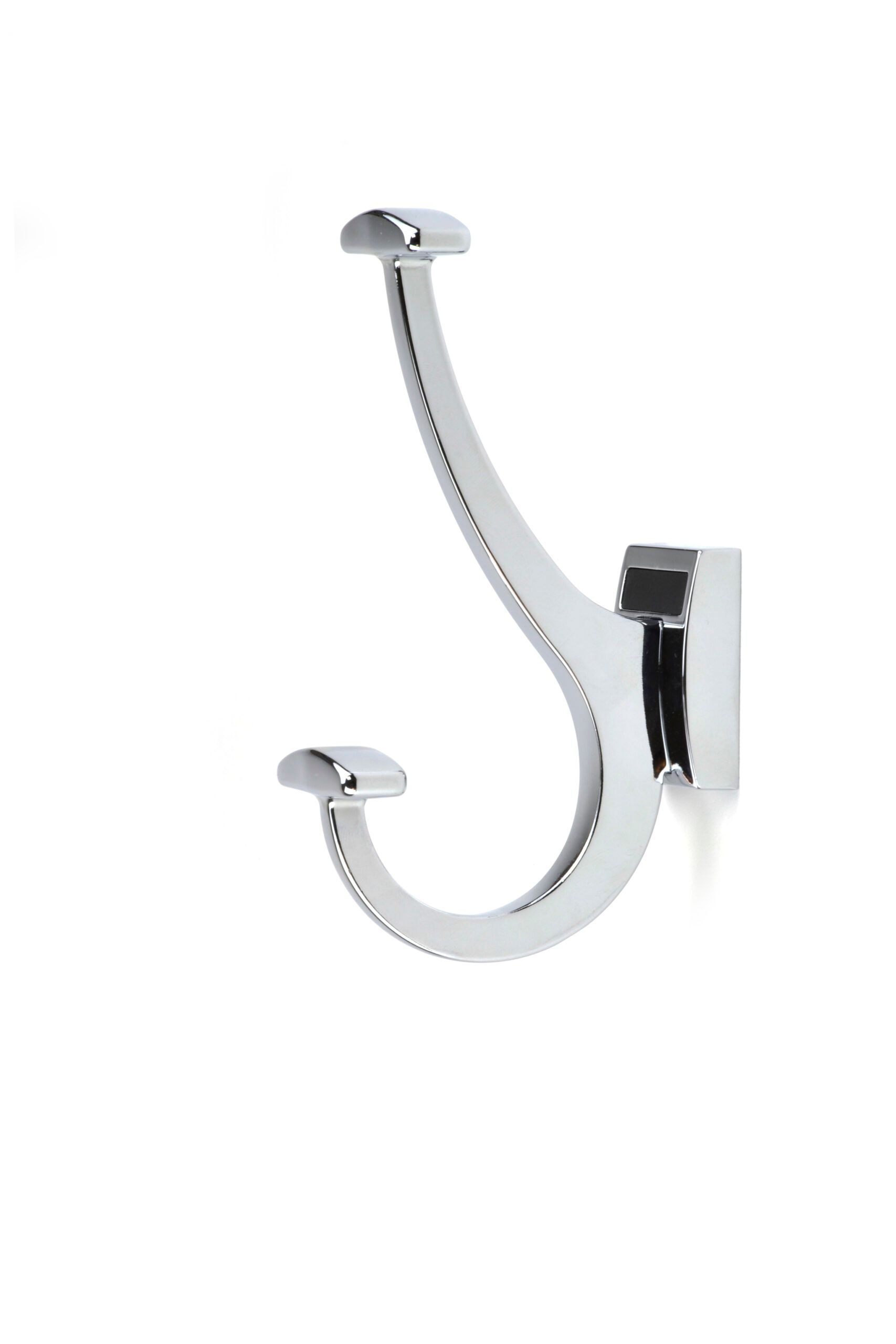 A chrome coat hook is hanging on a white wall.