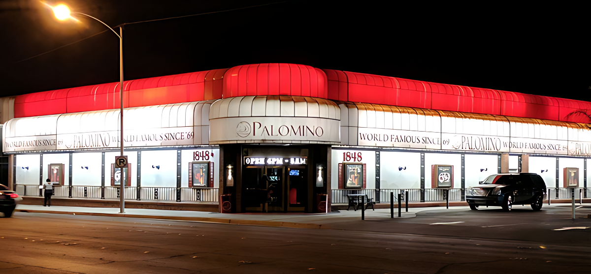 A car is parked in front of a building that says casino