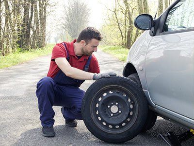Vehicle Breakdown — Man Fixing Tire Car in North Chesterfield, VA