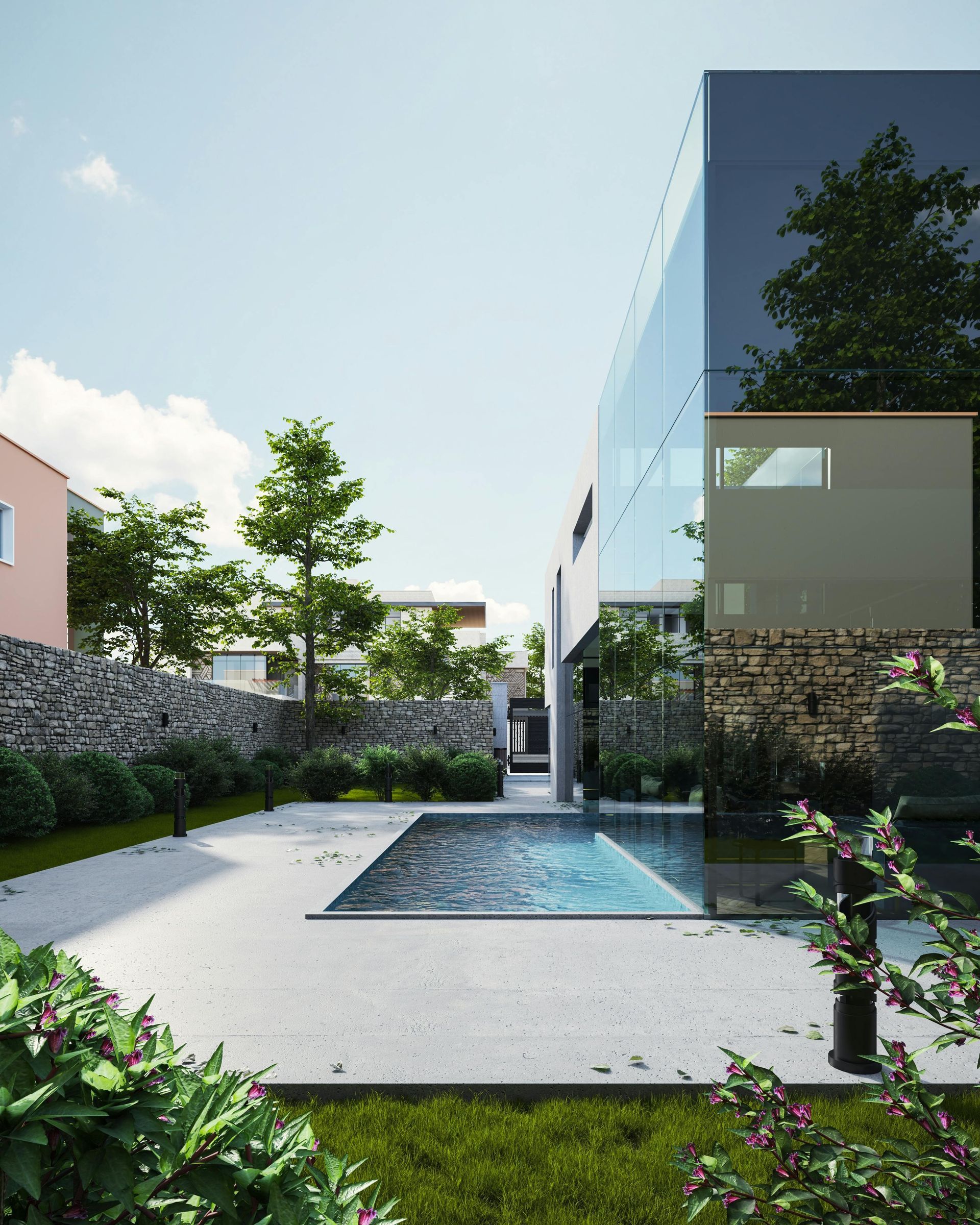 Tan and orange two-story townhouse with garage, shutters, palm tree, and concrete driveway.