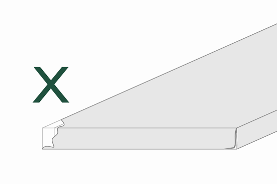 A white piece of paper with a green x on it.