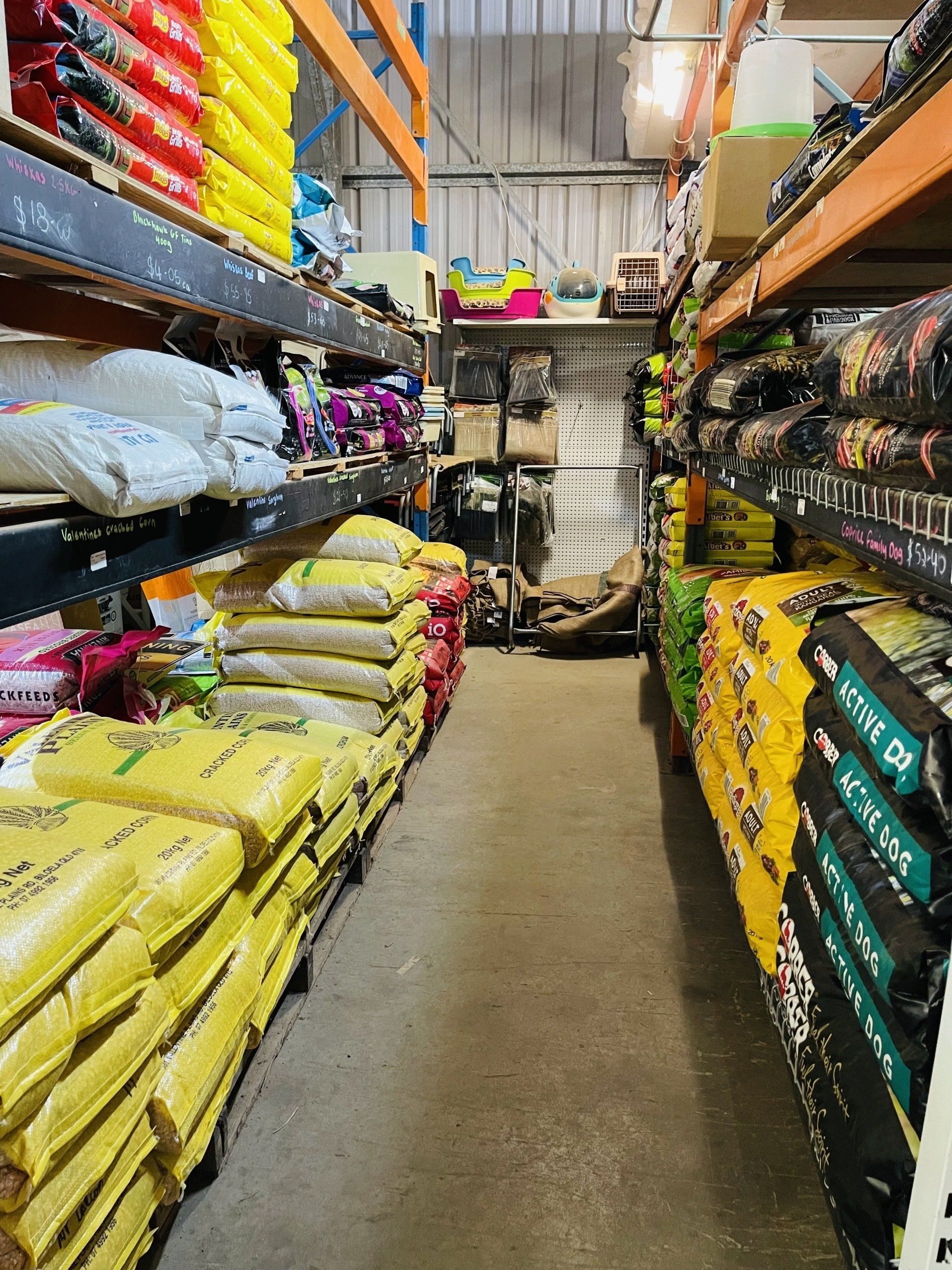 A warehouse filled with lots of bags of food.