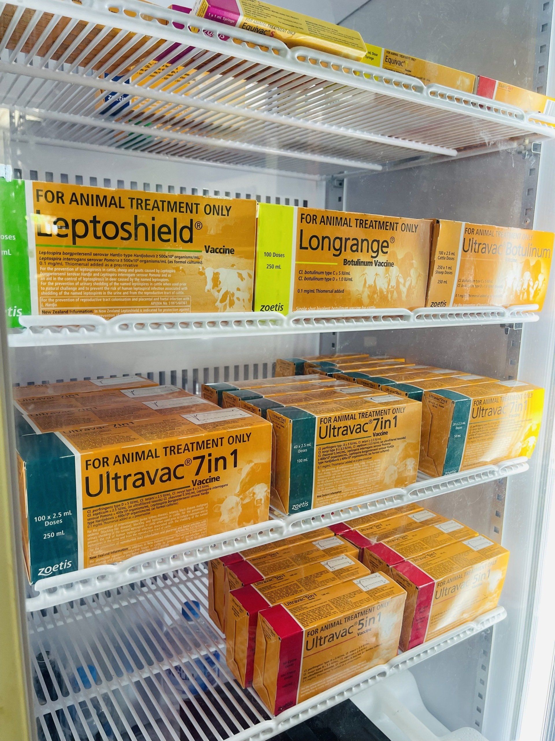 A refrigerator filled with lots of boxes of food.