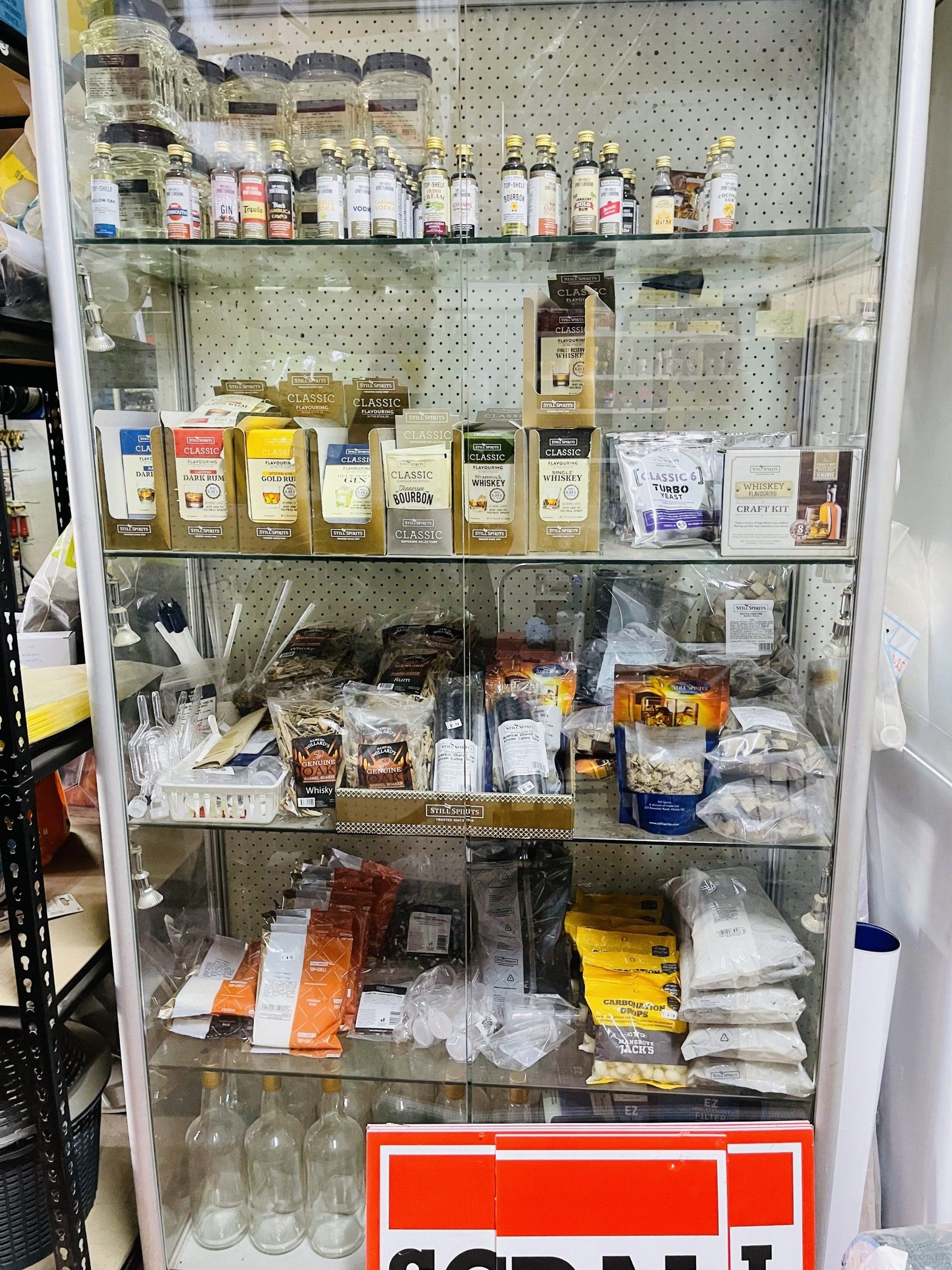A glass display case filled with lots of food items