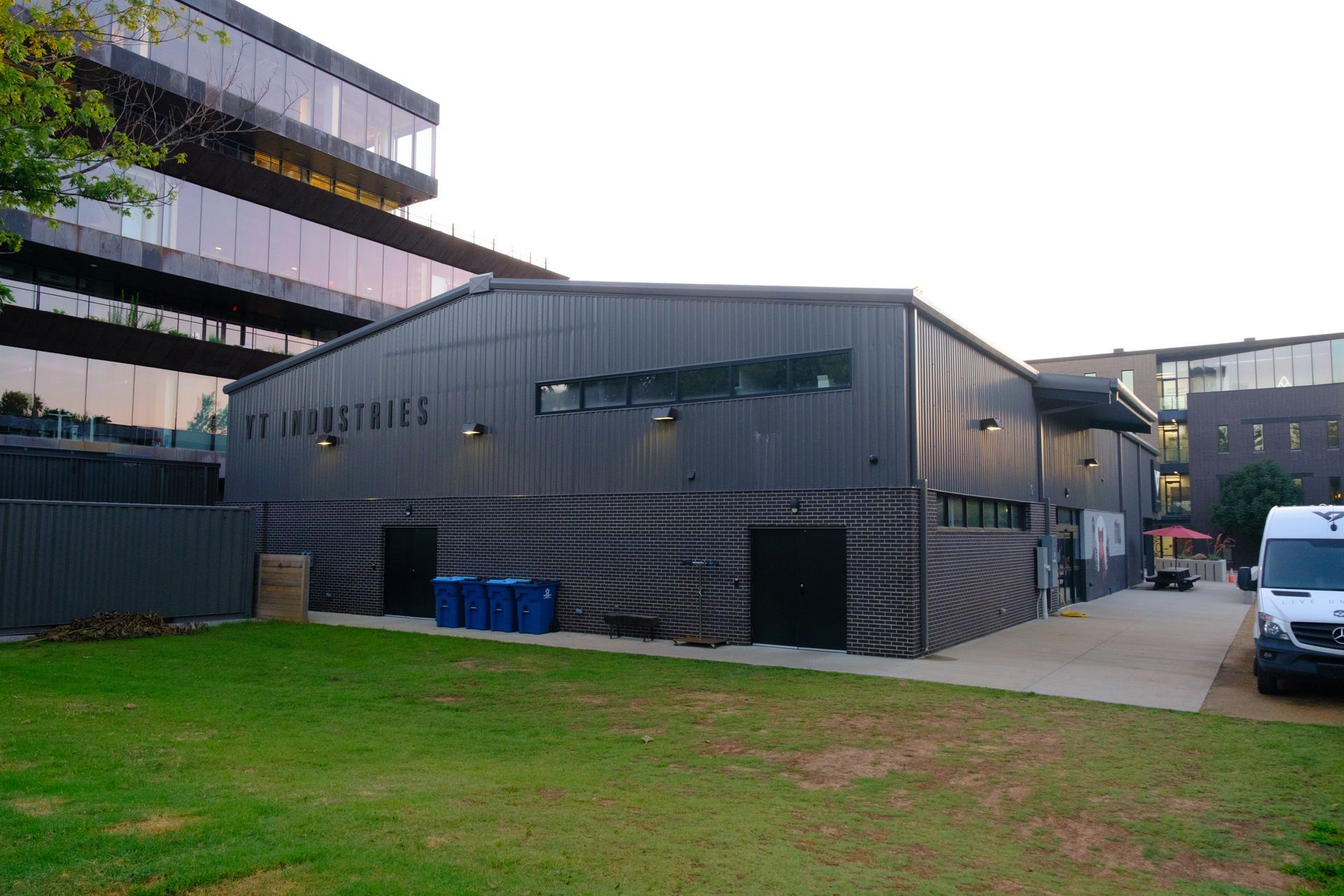 Dark gray corrugated metal building with 