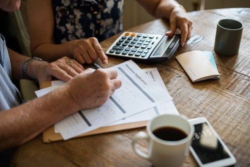 Family filling insurance forms