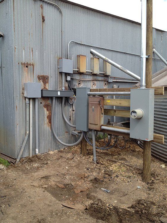 a building with a lot of wires coming out of it