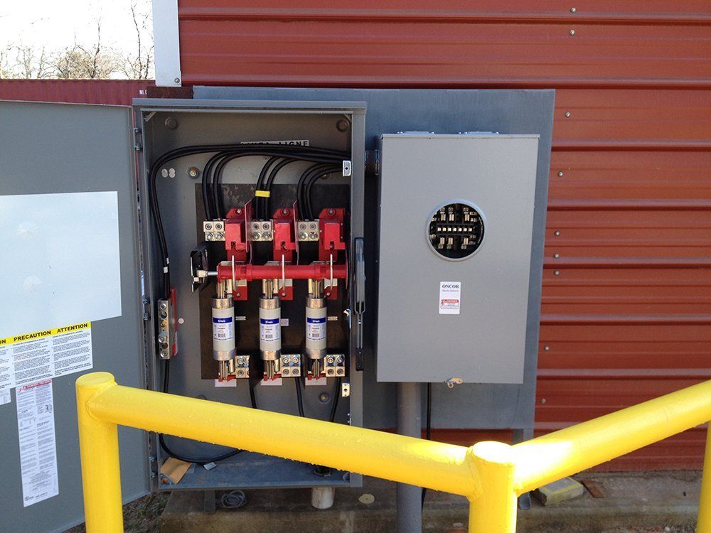 a electrical box with a yellow fence around it