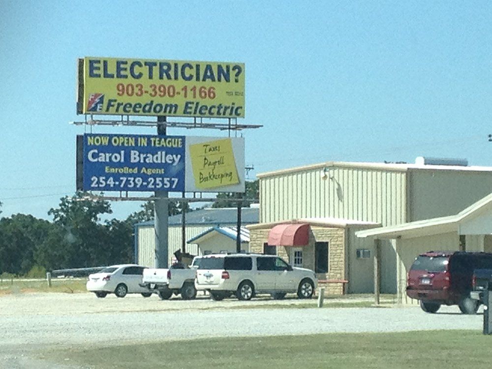 a billboard that says electrician on it