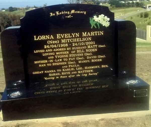 black and gold headstone