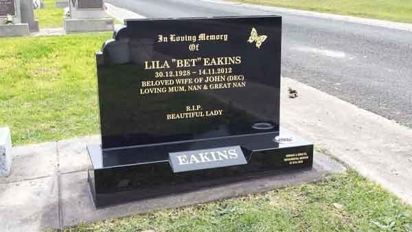 custom headstone with gold butterfly