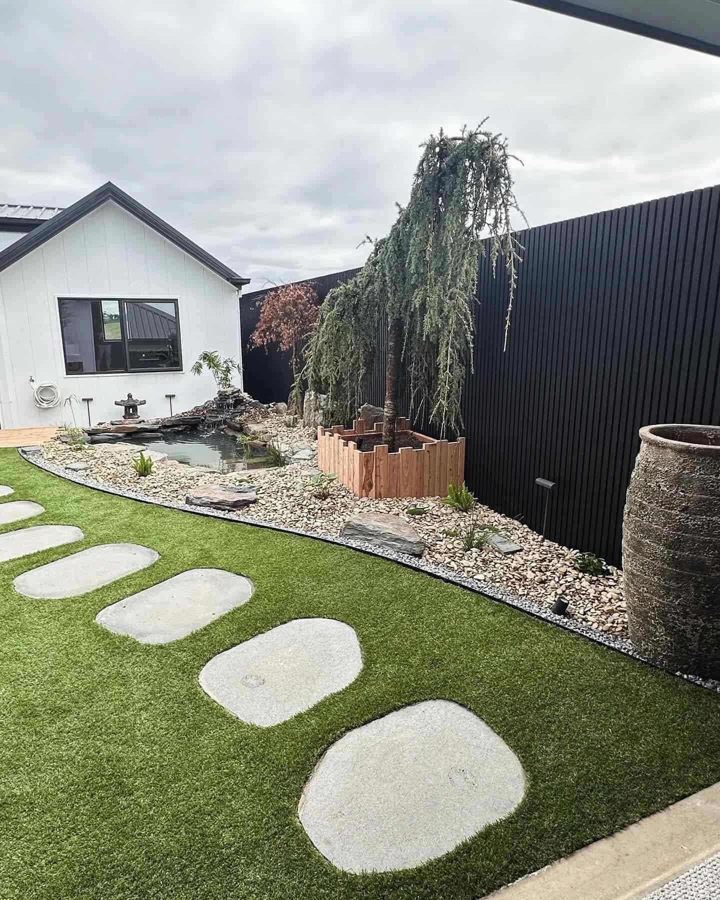 Stone path leads through a modern backyard — MGP Landscaping in Geelong, VIC 