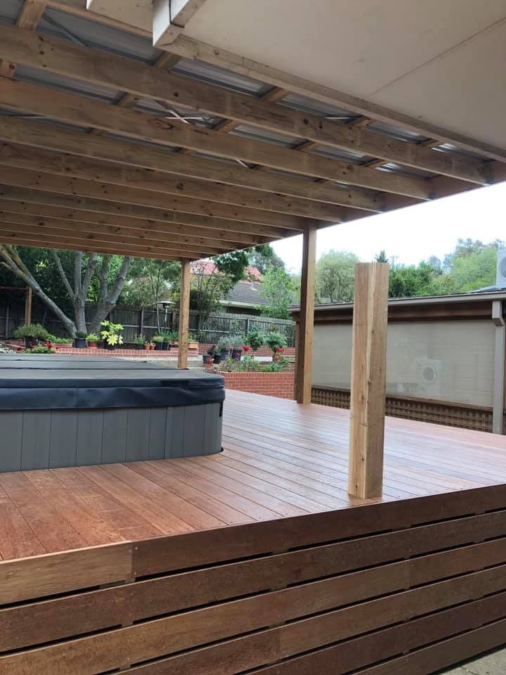 Wooden Deck with Hot Tub Under a Wooden Pergola — MGP Landscaping in Geelong, VIC 