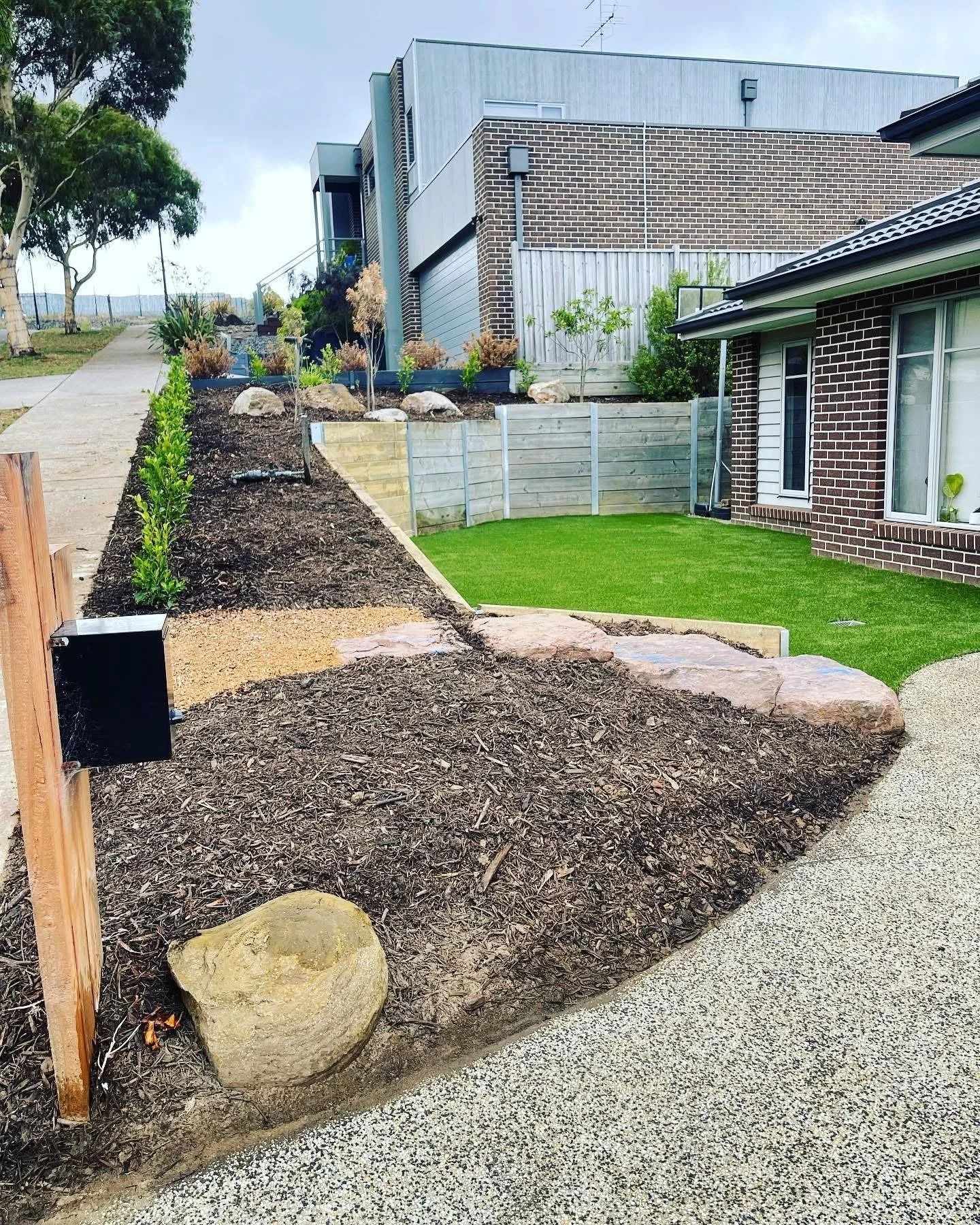 A Landscaped Front Yard With a Path, Mulch, Stepping Stones — MGP Landscaping in Geelong, VIC 