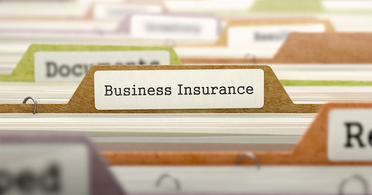 Close up of business insurance folders